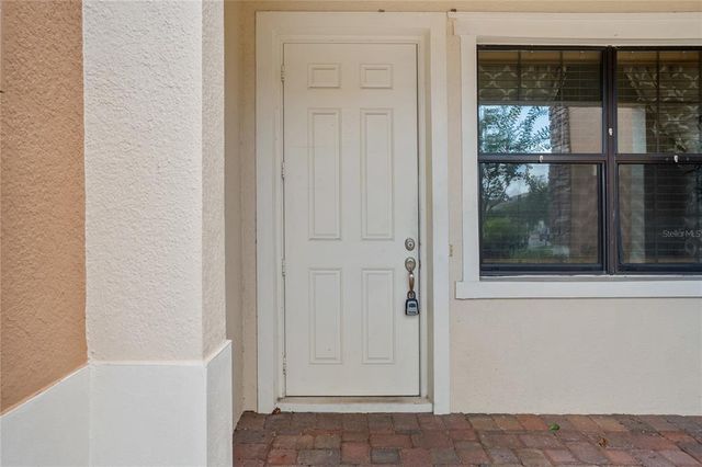 1833 PORTOFINO MEADOWS BOULEVARD, Orlando, FL 32824