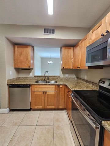 1049 GOLDEN LAKES Boulevard 115, West Palm Beach, FL 33411
