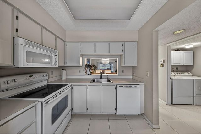 7351 Kinghurst Drive 106, Delray Beach, FL 33446