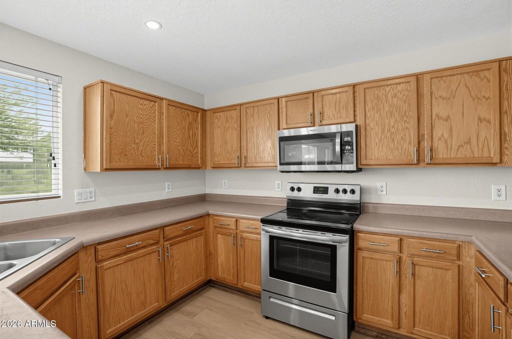 22311 W WOODLANDS Avenue, Buckeye, AZ 85326 — photo 4