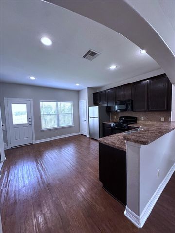 59 Woodland Hills Drive A, Conroe, TX 77303