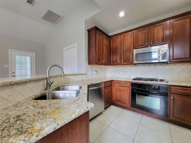 15607 Tarpon Springs Court, Houston, TX 77095