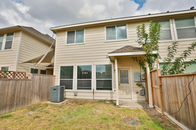 1606 Grable Cove Lane, Spring, TX 77379