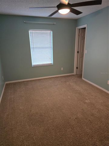 8701 VILLAGE GREEN BOULEVARD, Clermont, FL 34711