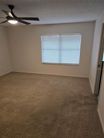 8701 VILLAGE GREEN BOULEVARD, Clermont, FL 34711