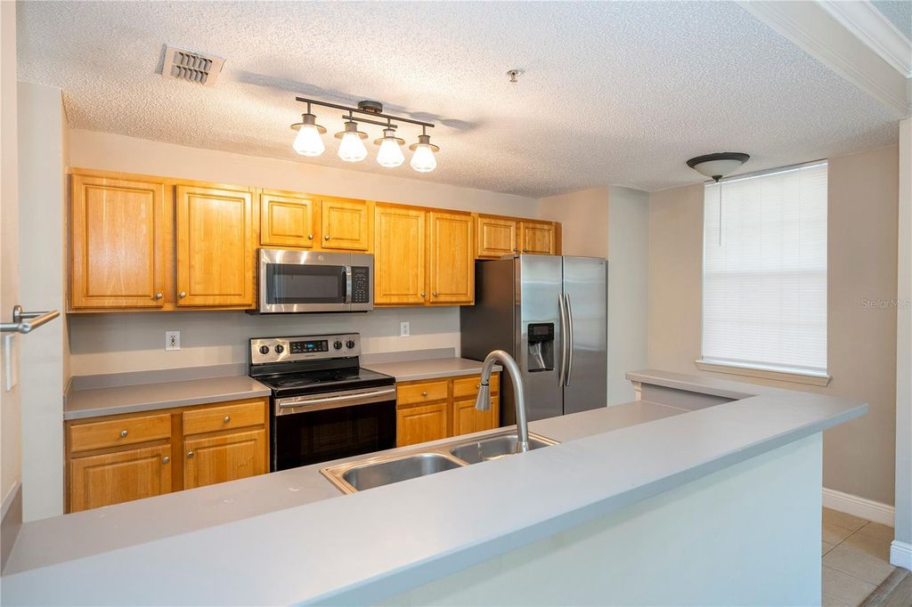 Image 55 of property listing at 12102 POPPY FIELD LANE 107, Orlando, FL 32837