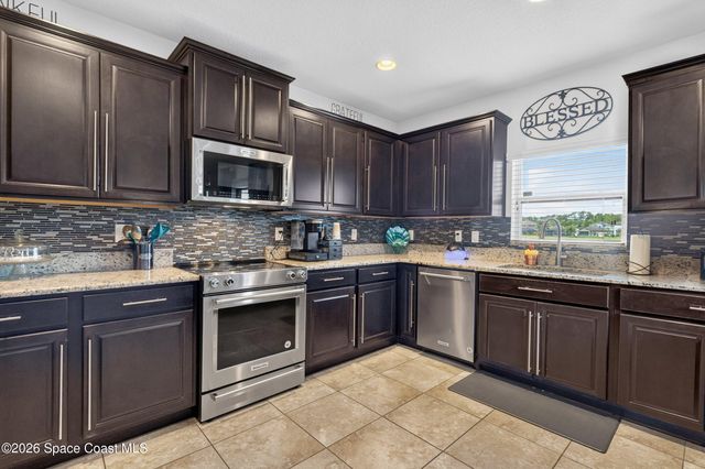 1764 Musgrass Circle, West Melbourne, FL 32904