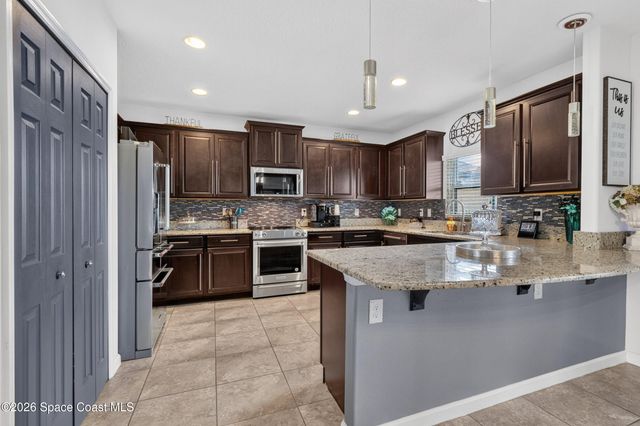 1764 Musgrass Circle, West Melbourne, FL 32904