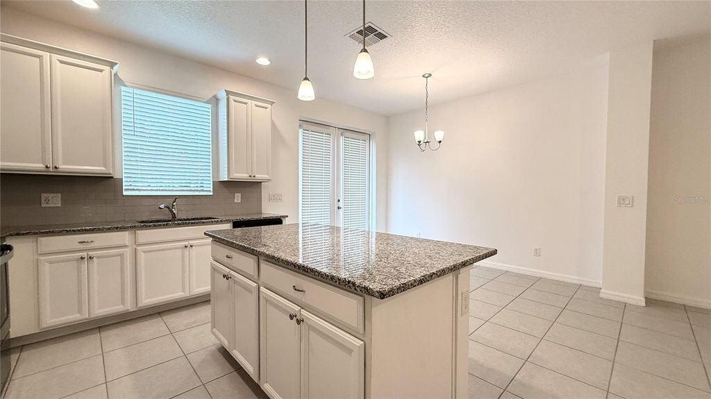 Image 5 of property listing at 6910 TUSSILAGO WAY, Orlando, FL 32822