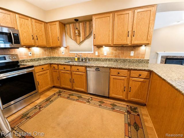4656 Desert Bridge Court, Highland, MI 48356