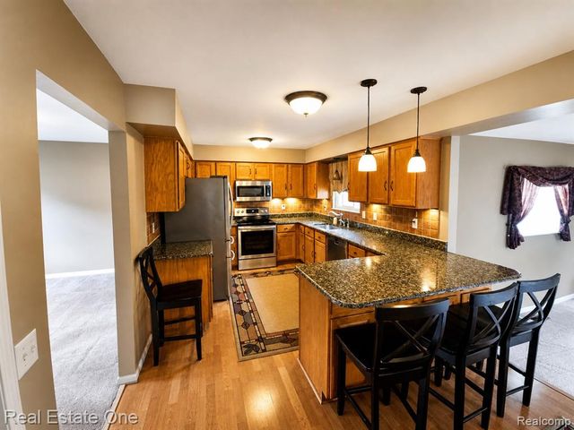 4656 Desert Bridge Court, Highland, MI 48356