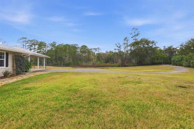 1713 REYNOLDS ROAD, De Leon Springs, FL 32130