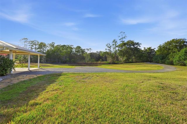 1713 REYNOLDS ROAD, De Leon Springs, FL 32130