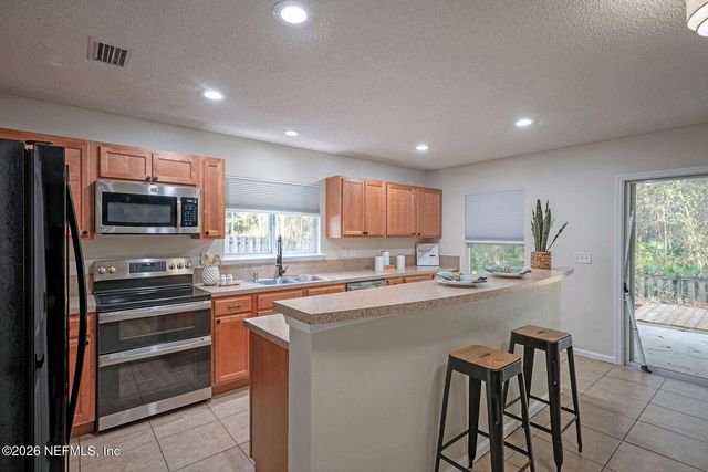 2541 REAGAN LAKES Lane, Jacksonville, FL 32221