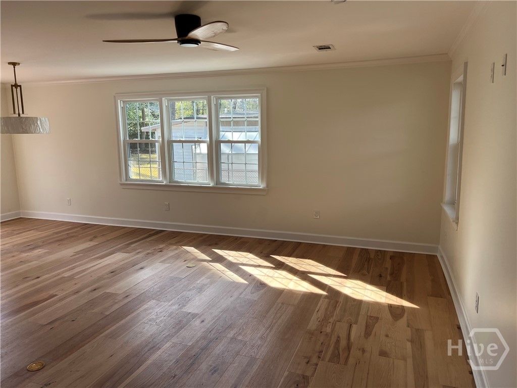 Image 5 of property listing at 233 E Derenne Avenue, Savannah, GA 31405