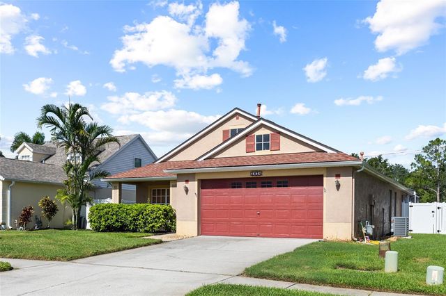 1674 MEADOW OAK LANE, Tarpon Springs, FL 34689