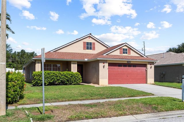1674 MEADOW OAK LANE, Tarpon Springs, FL 34689