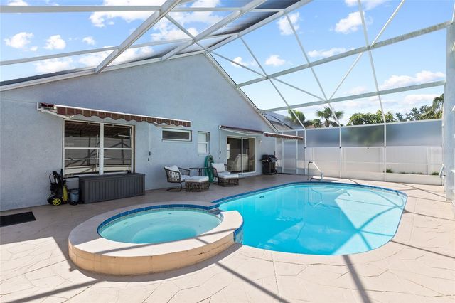 1674 MEADOW OAK LANE, Tarpon Springs, FL 34689