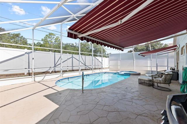 1674 MEADOW OAK LANE, Tarpon Springs, FL 34689