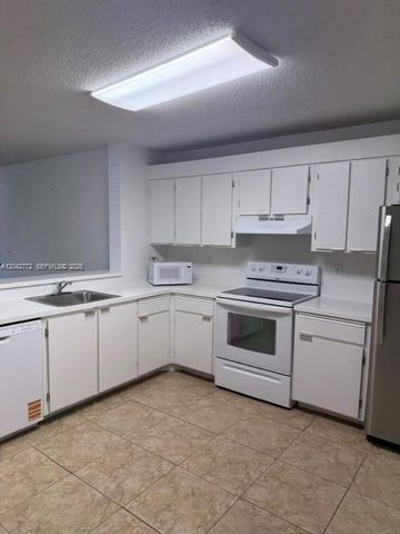 5721 Riverside Dr 103B5, Coral Springs, FL 33067