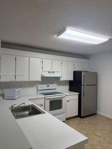 5721 Riverside Dr 103B5, Coral Springs, FL 33067