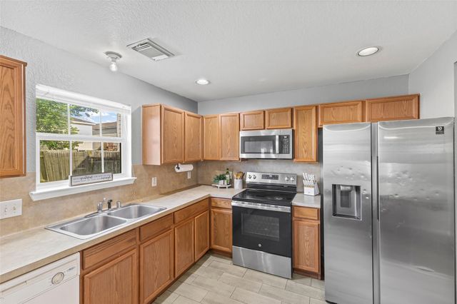 9439 Gnarled Chestnut Court, Houston, TX 77075