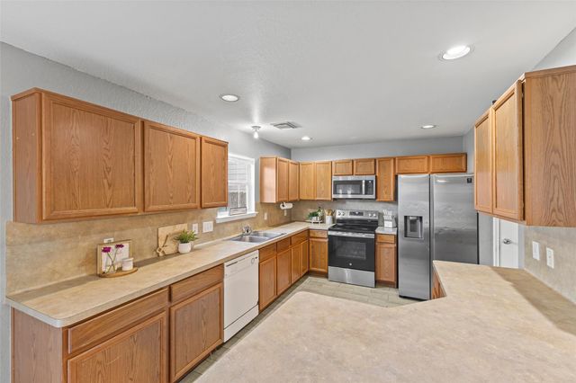 9439 Gnarled Chestnut Court, Houston, TX 77075