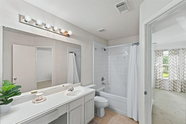 9439 Gnarled Chestnut Court, Houston, TX 77075