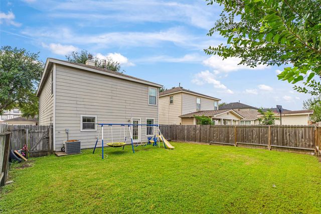 9439 Gnarled Chestnut Court, Houston, TX 77075