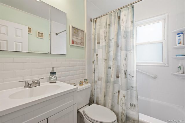 24 Broadmoor Lane, Westbury, NY 11590