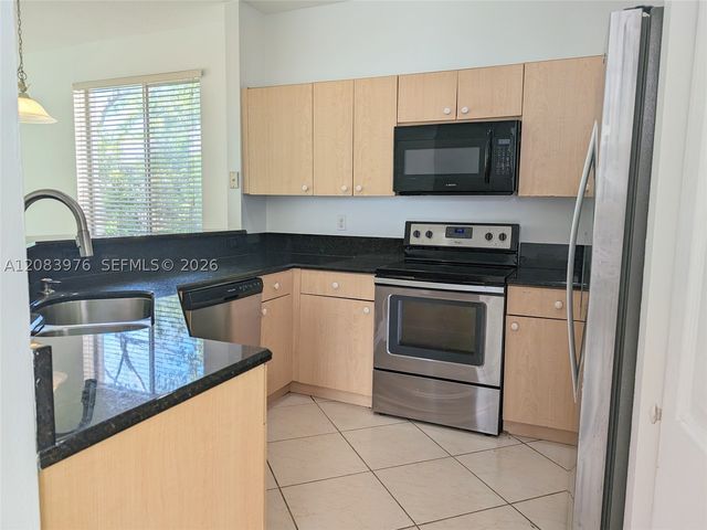 911 Phoenix Way, Weston, FL 33327