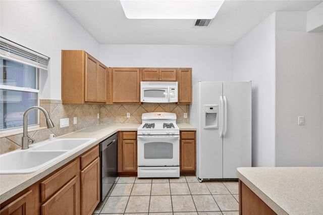 23613 Twisting Falls Drive, Spring, TX 77373