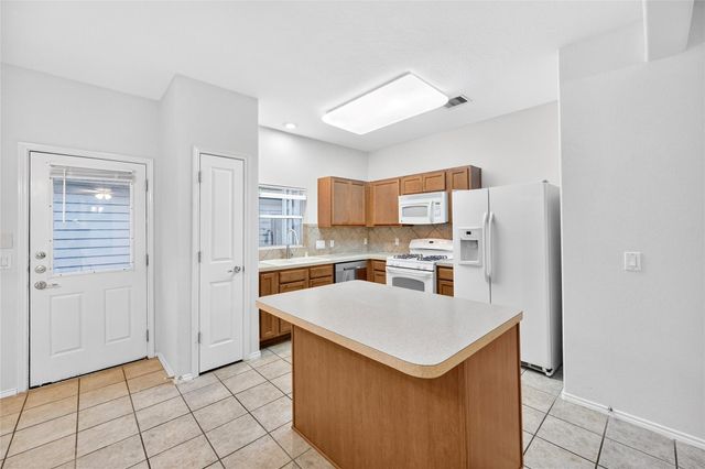 23613 Twisting Falls Drive, Spring, TX 77373