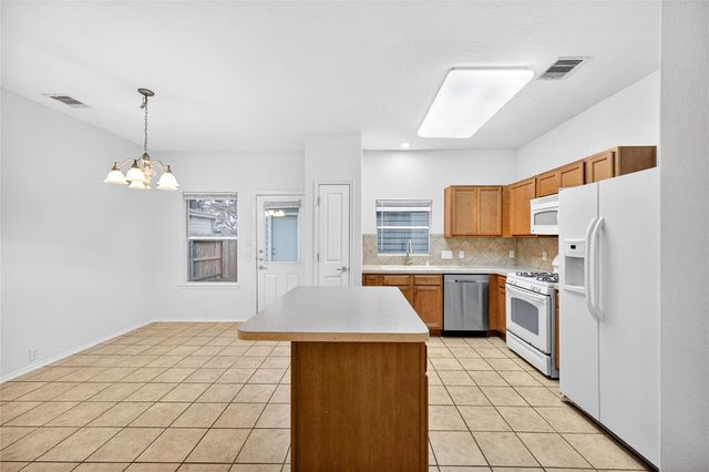 23613 Twisting Falls Drive, Spring, TX 77373