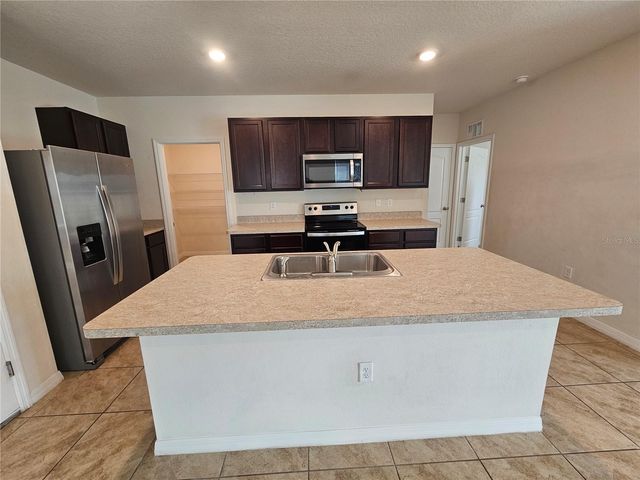 1387 BERRY LANE, Davenport, FL 33837