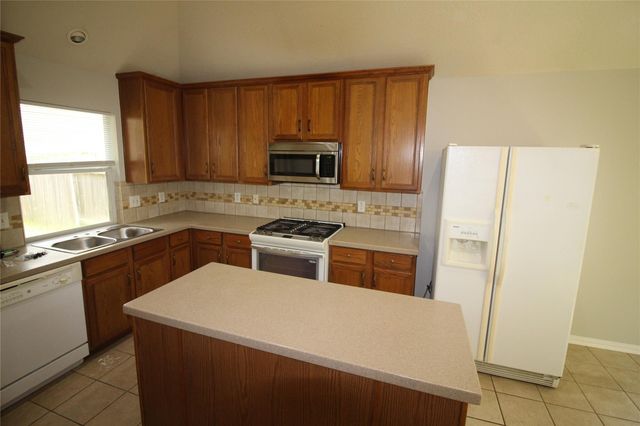 1011 Lexington Green Drive, Missouri City, TX 77459