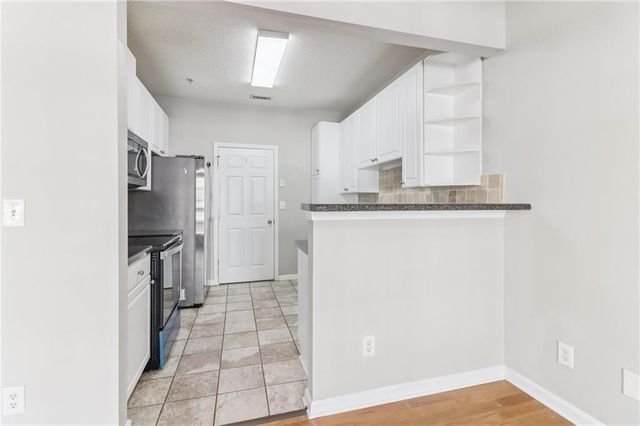 5112 Woodland Lane, Alpharetta, GA 30009