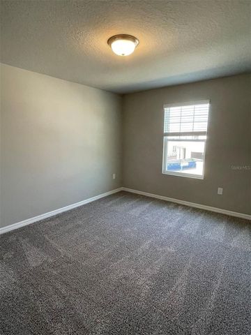 231 WHISTLING DUCK TRAIL, St Cloud, FL 34771