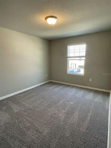 231 WHISTLING DUCK TRAIL, St Cloud, FL 34771