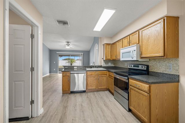 6114 SCHOOL HOUSE COURT, Wesley Chapel, FL 33545