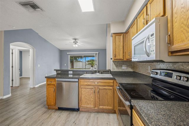 6114 SCHOOL HOUSE COURT, Wesley Chapel, FL 33545