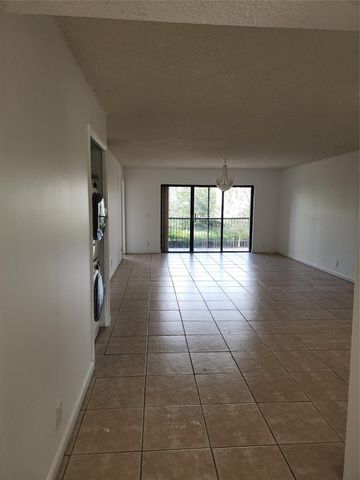 390 Racquet Club Road 204, Weston, FL 33326