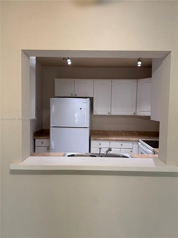 4153 NW 90th Avenue 206, Coral Springs, FL 33065