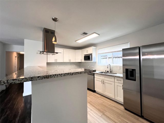 11831 Briar Forest Drive, Houston, TX 77077