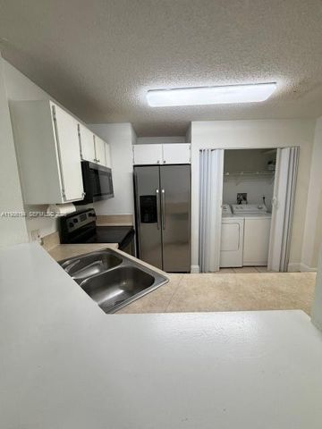 3413 NW 44th St 202, Oakland Park, FL 33309