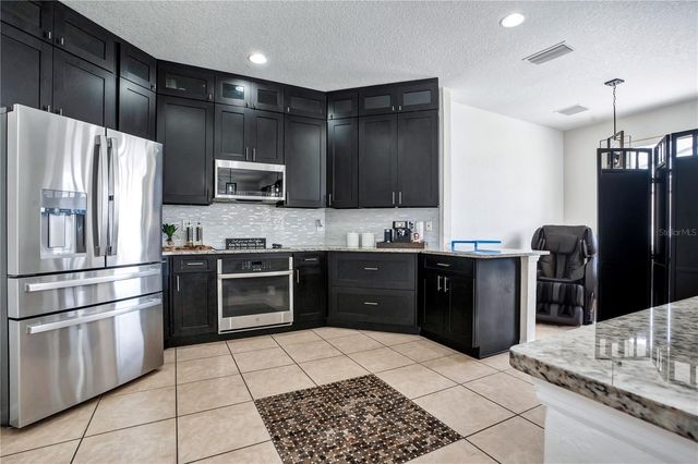 3571 MAPLE RIDGE LOOP, Kissimmee, FL 34741