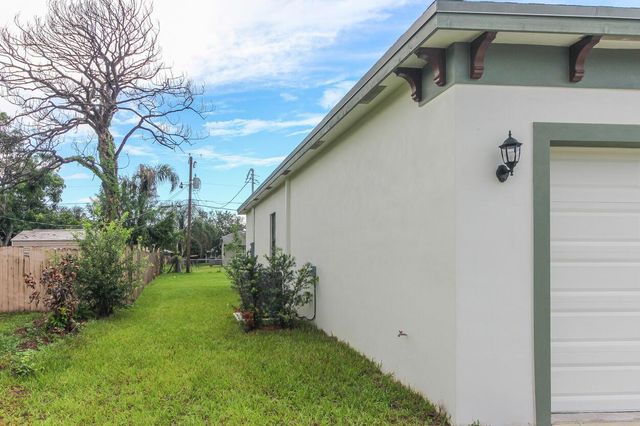 1143 SW Estaugh Avenue, Port St. Lucie, FL 34953