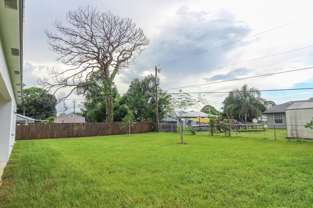 1143 SW Estaugh Avenue, Port St. Lucie, FL 34953