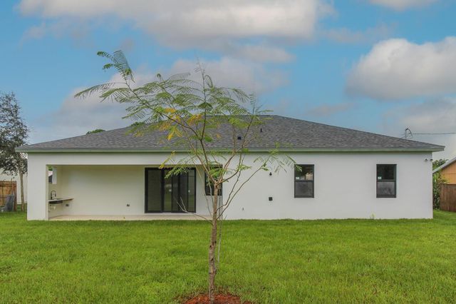 1143 SW Estaugh Avenue, Port St. Lucie, FL 34953