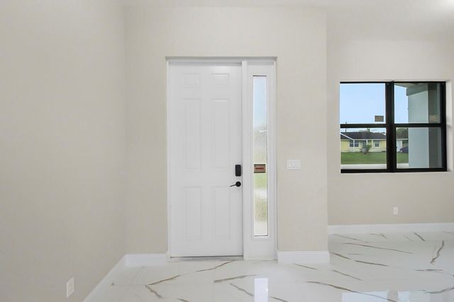 1143 SW Estaugh Avenue, Port St. Lucie, FL 34953